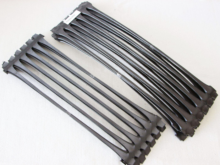 One-way tensile plastic geogrid roadbed reinforcement One-way tensile plastic geogrid roadbed reinforcement